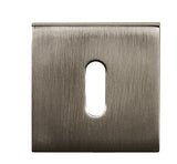 Quality image of Tupai Rapido Curva/QuadraLine Key Escutcheons on Square Rose - Titanium | Sku. tesckstt | available from Trade Door Handles.
