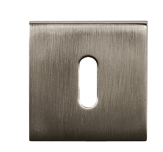 Quality image of Tupai Rapido Curva/QuadraLine Key Escutcheons on Square Rose - Titanium | Sku. tesckstt | available from Trade Door Handles.