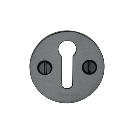 High quality image of Heritage Brass - Standard Key Escutcheon Round - V1010 - Matt Black | Sku. v1010-bkmt | available to order from Trade Door Handles in Kendal.