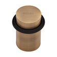 High quality image of the Heritage Brass Round Door Stop Antique Brass Finish
 | Sku. v1083-at | Discounted prices available from Trade Door Handles