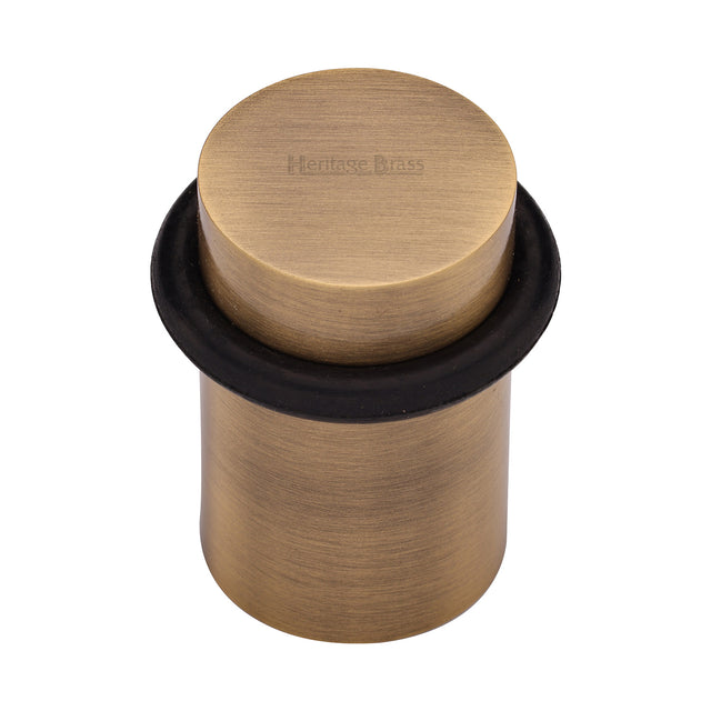 High quality image of the Heritage Brass Round Door Stop Antique Brass Finish
 | Sku. v1083-at | Discounted prices available from Trade Door Handles