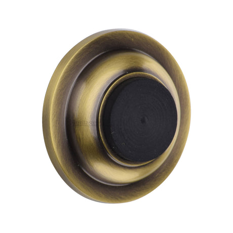 High quality image of the Heritage Brass Wall Mounted Door Stop Buffer Antique Brass Finish
 | Sku. v1194-at | Discounted prices available from Trade Door Handles