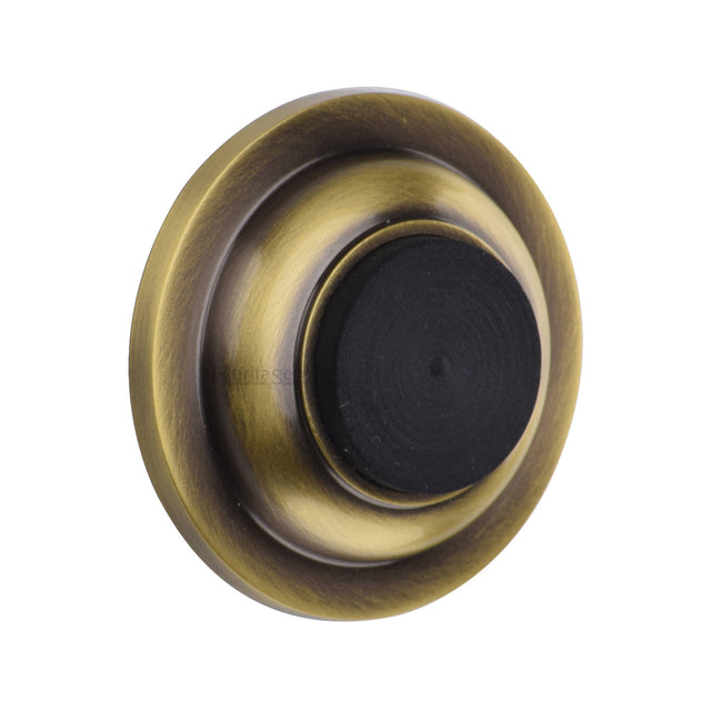 High quality image of the Heritage Brass Wall Mounted Door Stop Buffer Antique Brass Finish
 | Sku. v1194-at | Discounted prices available from Trade Door Handles