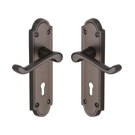 High quality image of the Heritage Brass Door Handle Lever Lock Meridian Design Matt Bronze Finish | Sku. v300-mb | Discounted prices available from Trade Door Handles