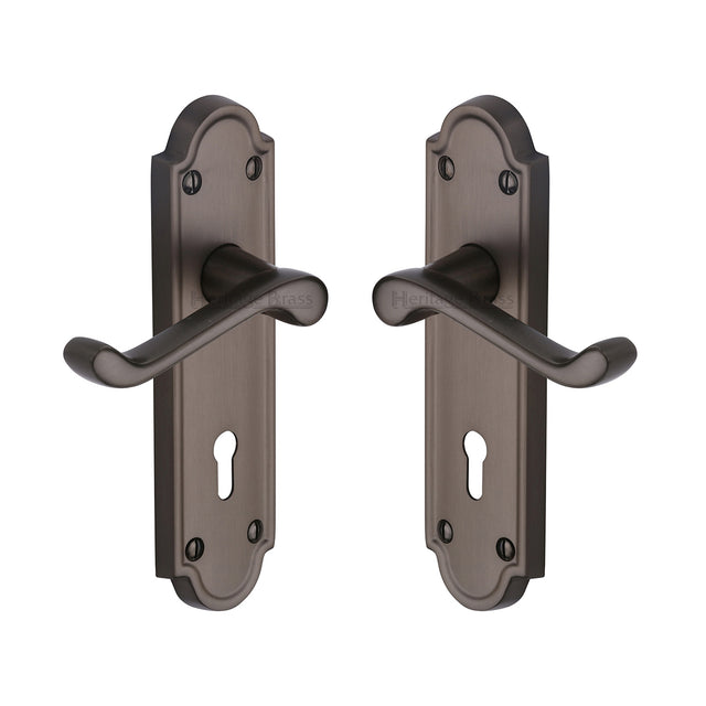 High quality image of the Heritage Brass Door Handle Lever Lock Meridian Design Matt Bronze Finish | Sku. v300-mb | Discounted prices available from Trade Door Handles