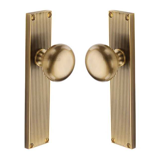High quality image of the Heritage Brass Mortice Knob on Reeded Latch Plate Victoria Design Antique Brass Finish
 | Sku. v9210-at | Discounted prices available from Trade Door Handles