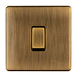This is an image of Eurolite - Concealed 3mm Intermediate Switch Antique Brass (With Black Trim) | Sku. abintb | available from Trade Door Handles.