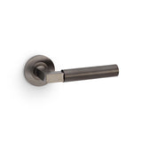 High quality image of Alexander & Wilks - Hurricane Plain Lever on Round Rose - Dark Bronze PVD | Sku. aw201dbzpvd | Trade Door Handles.