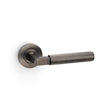 High quality image of Alexander & Wilks - Hurricane Reeded Lever on Round Rose - Dark Bronze PVD | Sku. aw202dbzpvd | Trade Door Handles.