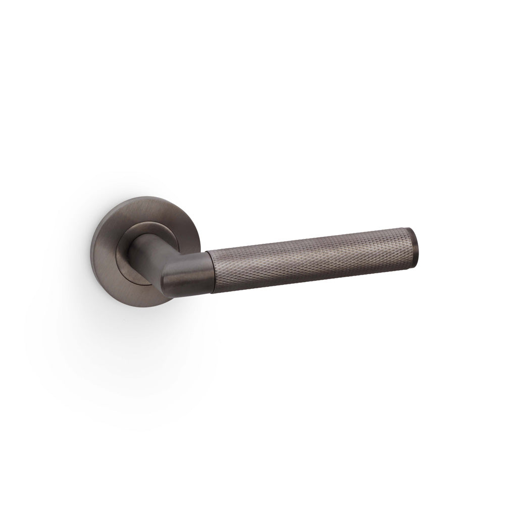 High quality image of Alexander & Wilks - Harrier Knurled Lever on Round Rose - Dark Bronze PVD | Sku. aw210dbzpvd | Trade Door Handles.