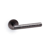 High quality image of Alexander & Wilks - Spitfire Hammered Lever on Round Rose - Dark Bronze | Sku. aw223dbz | Trade Door Handles.