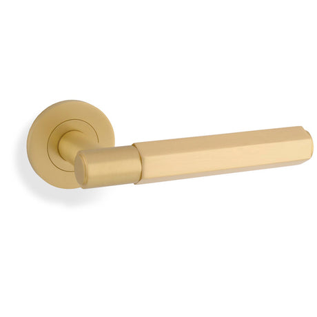 This is an image showing Alexander & Wilks - Spitfire Hex Lever on Round Rose - Satin Brass aw224sb available to order from Trade Door Handles in Kendal, quick delivery and discounted prices.
