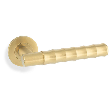 This is an image of Alexander & Wilks - Spitfire Bamboo Lever on Rose - Satin Brass PVD available to order from Trade Door Handles in Kendal, quick delivery and discounted prices.