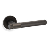 High quality image of Alexander & Wilks - Kingston Reeded lever on Round Rose-Dark Bronze PVD | Sku. aw242dbzpvd | Trade Door Handles.