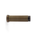 High quality image of Alexander & Wilks - Reeded Projection Door Stop - Antique Brass | Sku. aw602-75-ab | Trade Door Handles.