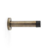 High quality image of Alexander & Wilks - Cylinder Projection Door Stop on Rose - Antique Brass | Sku. aw616ab | Trade Door Handles.