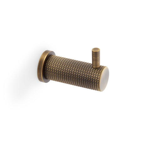 High quality image of Alexander & Wilks - Brunel Knurled Coat Hook - Antique Brass | Sku. aw775ab | Trade Door Handles.