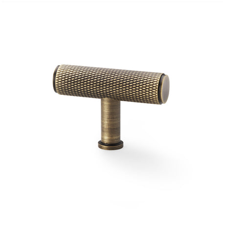 High quality image of Alexander & Wilks Crispin Knurled T-bar Cupboard Knob - Antique Brass | Sku. aw801-55-ab | Trade Door Handles.