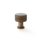 High quality image of Alexander & Wilks Lucia Knurled Cupboard Knob - Antique Brass - 29mm | Sku. aw807k-29-ab | Trade Door Handles.