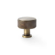 High quality image of Alexander & Wilks Lucia Reeded Cupboard Knob - Antique Brass - 35mm | Sku. aw807r-35-ab | Trade Door Handles.