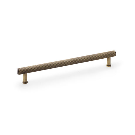High quality image of Alexander & Wilks Crispin Reeded T-bar Cupboard Pull Handle - Antique Brass - 224mm | Sku. aw809r-224-ab | Trade Door Handles.
