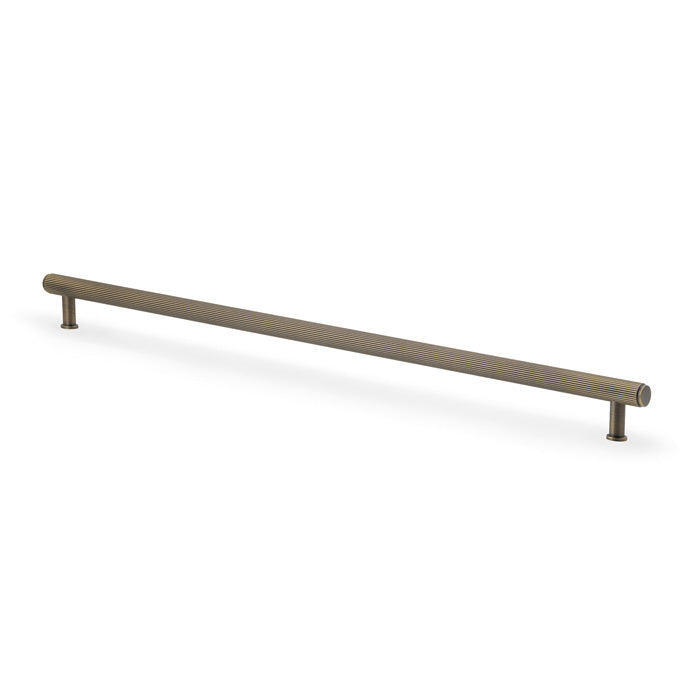 High quality image of Alexander & Wilks Crispin Reeded T-bar Cupboard Pull Handle--448mm Centres - Antique Brass | Sku. AW809R-448-AB | Trade Door Handles.