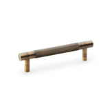 High quality image of Alexander & Wilks Brunel Knurled T-Bar Cupboard Handle - Antique Brass - Centres 96mm | Sku. aw810-96-ab | Trade Door Handles.