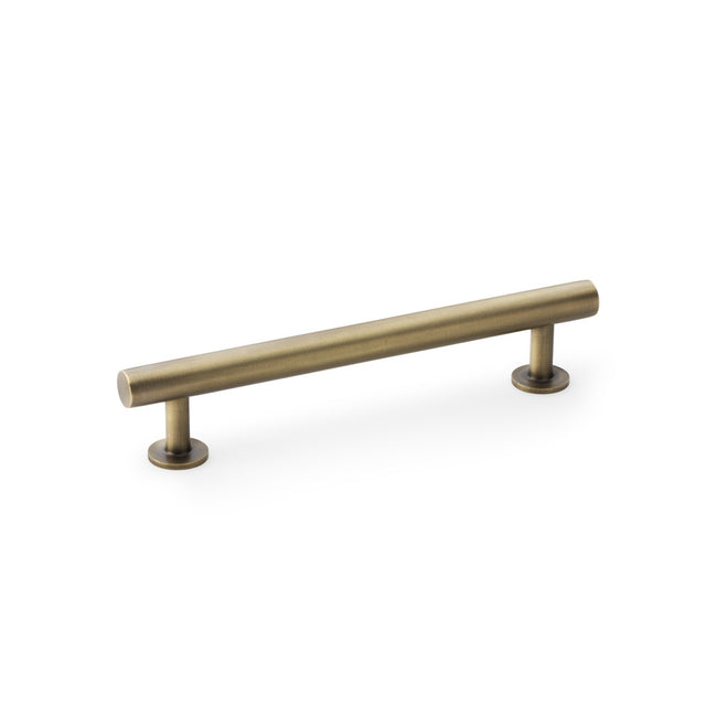 High quality image of Alexander & Wilks Round T-Bar Cabinet Pull Handle - Antique Brass - Centres 128mm | Sku. aw814-128-ab | Trade Door Handles.