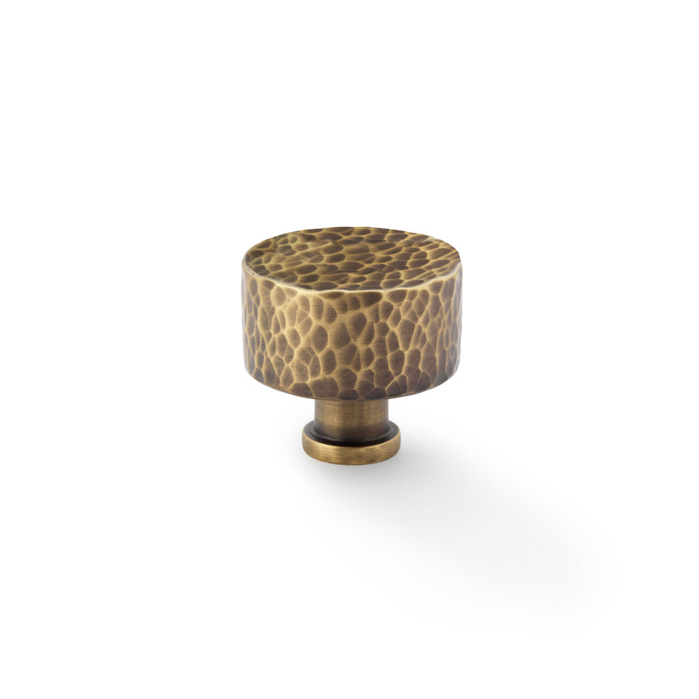 High quality image of Alexander & Wilks Leila Hammered Cupboard Knob - Antique Brass - 35mm | Sku. aw816-35-ab | Trade Door Handles.