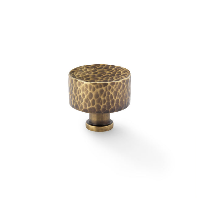 High quality image of Alexander & Wilks Leila Hammered Cupboard Knob - Antique Brass - 35mm | Sku. aw816-35-ab | Trade Door Handles.