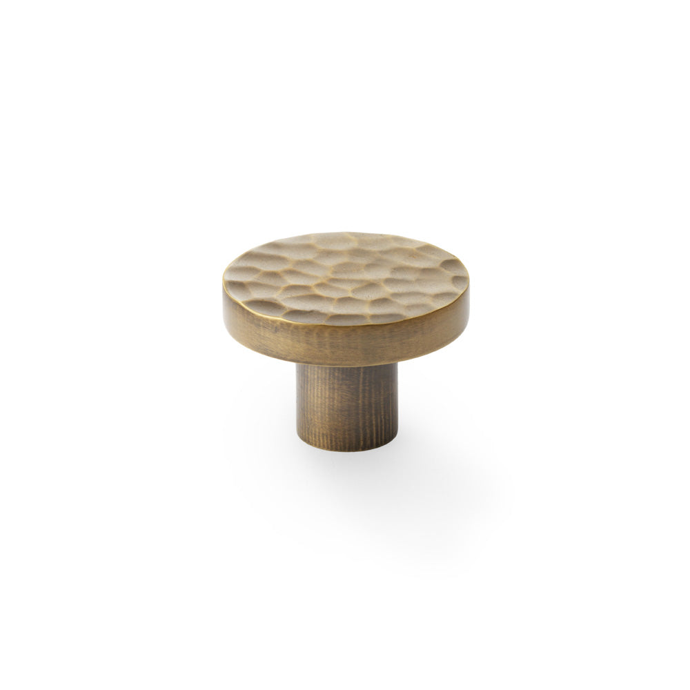 High quality image of Alexander & Wilks Hanover Hammered Cupboard Knob - Antique Brass - 38mm | Sku. aw820-38-ab | Trade Door Handles.