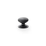 High quality image of Alexander & Wilks Waltz Round Cupboard Knob on Stepped Rose - Black - 25mm | Sku. aw825-25-bl | Trade Door Handles.