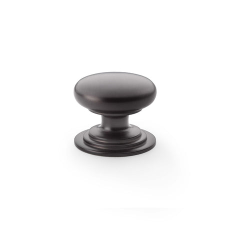 High quality image of Alexander & Wilks Waltz Round Cupboard Knob on Stepped Rose - Dark Bronze - 38mm | Sku. aw825-38-dbz | Trade Door Handles.