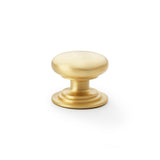High quality image of Alexander & Wilks Waltz Round Cupboard Knob on Stepped Rose - Satin Brass - 38mm | Sku. aw825-38-sb | Trade Door Handles.