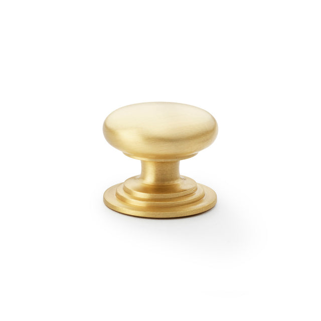 High quality image of Alexander & Wilks Waltz Round Cupboard Knob on Stepped Rose - Satin Brass - 38mm | Sku. aw825-38-sb | Trade Door Handles.