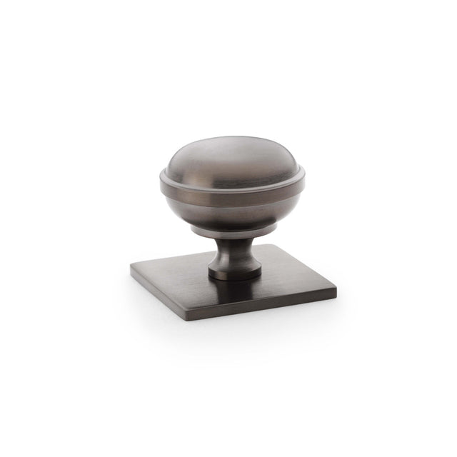 High quality image of Alexander & Wilks Quantock Cupboard Knob on Square Backplate - Dark Bronze PVD - 34mm | Sku. aw826-34-dbzpvd | Trade Door Handles.