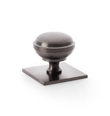 High quality image of Alexander & Wilks Quantock Cupboard Knob on Square Backplate - Dark Bronze PVD - 38mm | Sku. aw826-38-dbzpvd | Trade Door Handles.