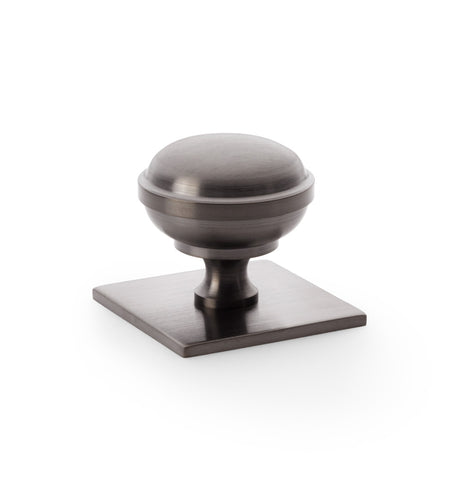 High quality image of Alexander & Wilks Quantock Cupboard Knob on Square Backplate - Dark Bronze PVD - 38mm | Sku. aw826-38-dbzpvd | Trade Door Handles.