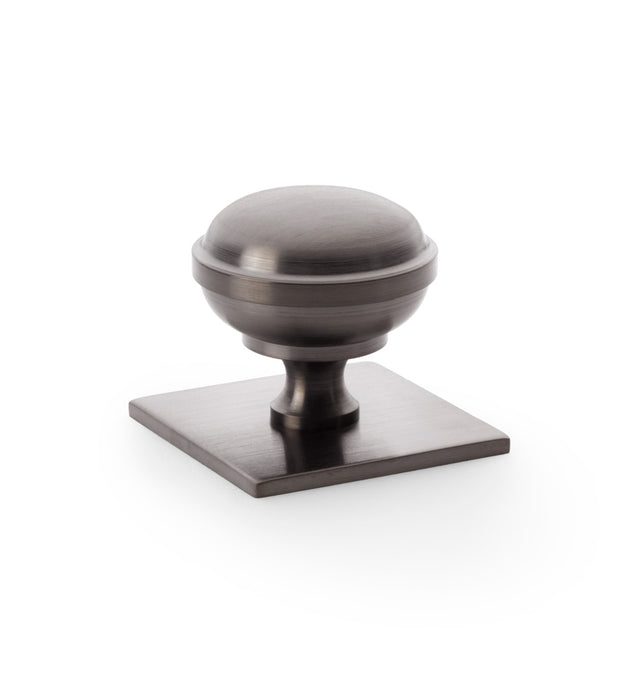 High quality image of Alexander & Wilks Quantock Cupboard Knob on Square Backplate - Dark Bronze PVD - 38mm | Sku. aw826-38-dbzpvd | Trade Door Handles.