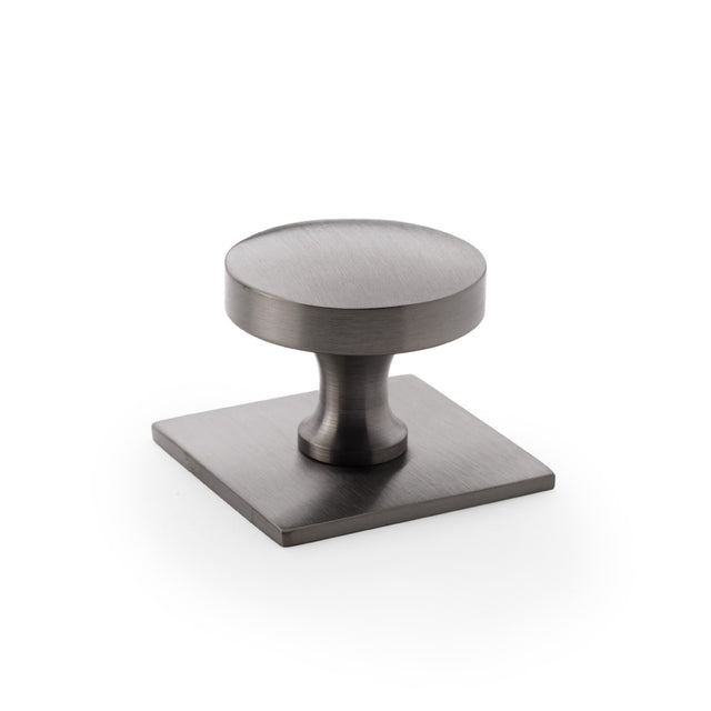 High quality image of Alexander & Wilks Bullion Cupboard Knob on Square Backplate - Dark Bronze PVD | Sku. aw835-38-dbzpvd | Trade Door Handles.