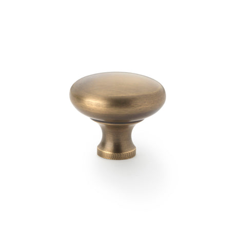 High quality image of Alexander & Wilks Wade Round Cupboard Knob - Antique Brass - 38mm | Sku. aw836-38-ab | Trade Door Handles.