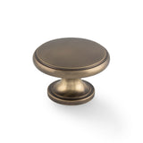 High quality image of Alexander & Wilks - Cambridge Round Cupboard Knob - Antique Brass | Sku. aw849-38-ab | Trade Door Handles.