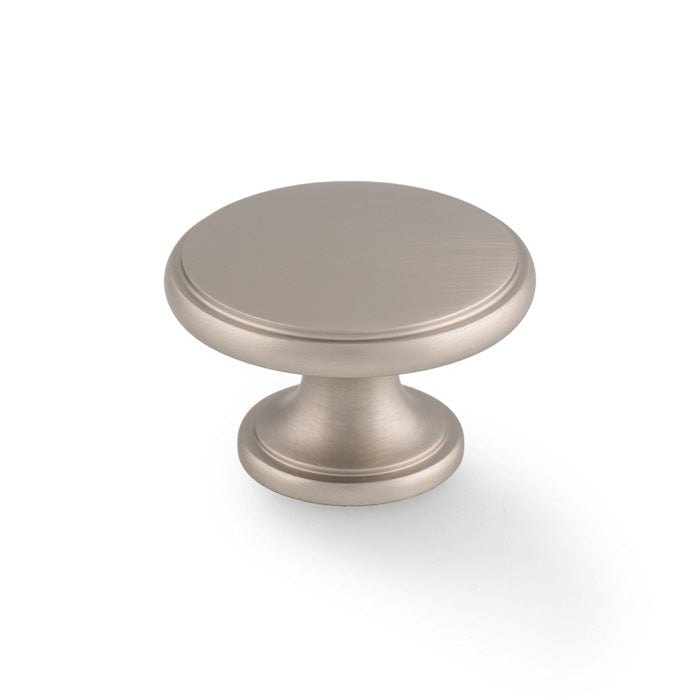 This is an image of Alexander & Wilks - Cambridge Round Cupboard Knob - Satin Nickel available to order from Trade Door Handles in Kendal, quick delivery and discounted prices.