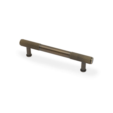 High quality image of Alexander & Wilks - Washington Reeded End Cabinet Pull-Antique Brass-128mm | Sku.AW854R-128-AB | Trade Door Handles.