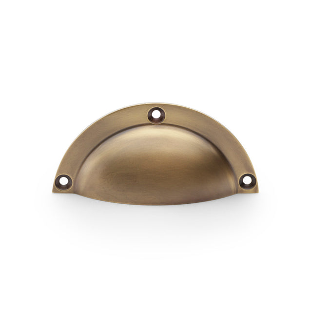 High quality image of Alexander & Wilks Raoul Cup Handle - Antique Brass | Sku. aw910ab | Trade Door Handles.