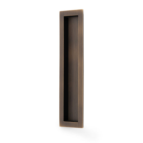 High quality image of Alexander & Wilks Rectangular flush pull - 100x45mm-Antique Brass-200mm | Sku. AW911-200-AB | Trade Door Handles.