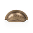 High quality image of Alexander & Wilks Bardom Hammered Ridged Cup Pull-Antique Brass | Sku. AW912AB | Trade Door Handles.