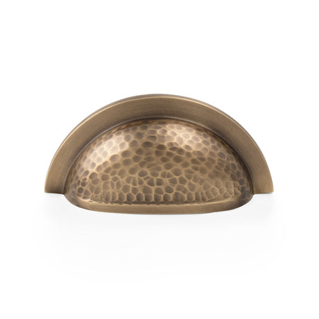 High quality image of Alexander & Wilks Bardom Hammered Ridged Cup Pull-Antique Brass | Sku. AW912AB | Trade Door Handles.