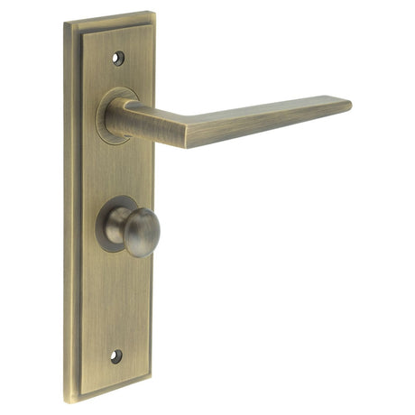 This is an image showing the Frelan - Mayfair Door Handle Bathroom Backplate Antique Brass & Turn & Release available to order from Trade Door Handles in Kendal