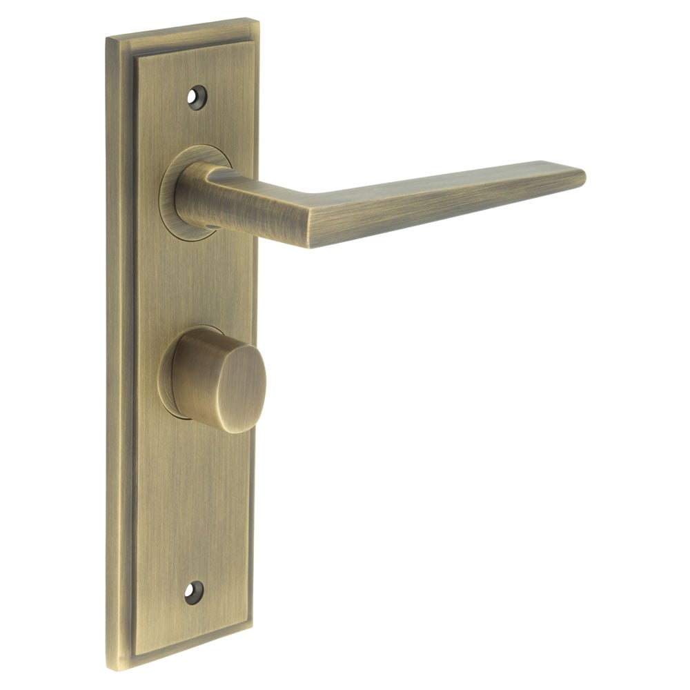 This is an image showing the Frelan - Mayfair Door Handle Bathroom Backplate Antique Brass & Turn & Release available to order from Trade Door Handles in Kendal